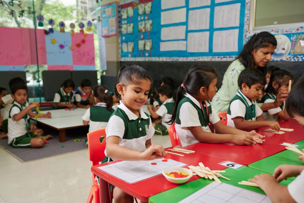 The pre-primary students at TGAA Chembur school making assignments. 